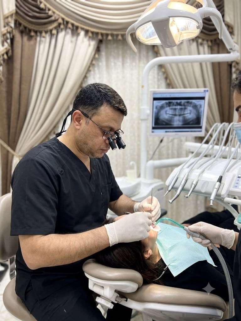 الدكتور محمد عشري الحمال لطب الأسنان